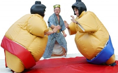 Your Gyoji refereeing a fight with Sumo Experience Adult suits